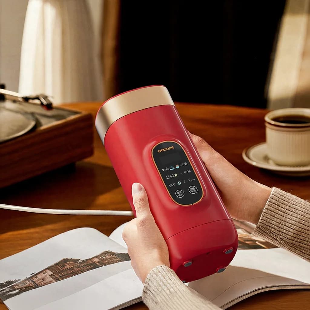 Pārnēsājama elektriskā ūdens sildīšanas krūze 650ml 304 iekšējā tvertne 220V